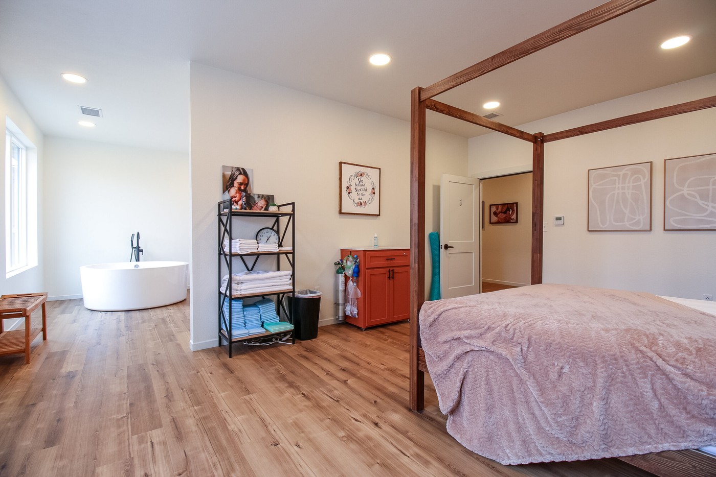 Peaceful birth center bedroom - private birthing suite at Heartbeat Midwifery